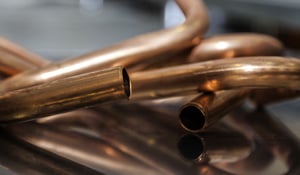 Making coffee machine components with coil-fed tube bending machines and end-forming machines.