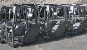 Manufacturing farming machinery cabs with laser tube cutting.